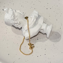Golden bow bracelet