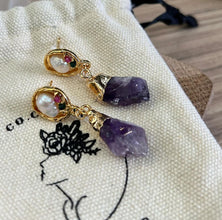 Pearl with hanging purple gemstone earrings