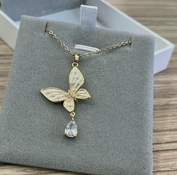 Pearl butterfly with hanging diamond necklace