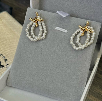 Pearl gold bow earrings