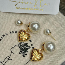 Pearl hanging hollowed heart earrings