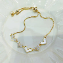 Shell and diamond love heart bracelet