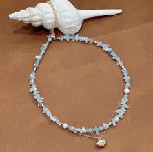 Blue gemstone with fresh water pearl necklace