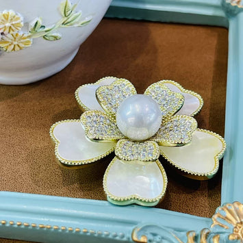 Shell flower with pearl brooch