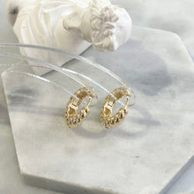 Gold loop earring