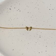 Golden bow bracelet