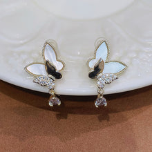 Double butterfly shell earring